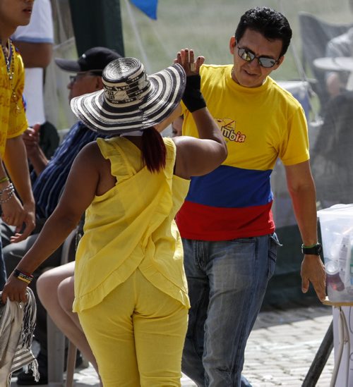 Members of the Latin American and surrounding communities gathered at the Scotiabank Stage at The Forks today for some fun in the sun at Latin Fest. The event features live music, dancing, a fashion show and cultural wares available for purchase until 11 p.m. tonight in an effort to encourage the construction of a cultural centre for the community. Saturday, July 20, 2013. (JESSICA BURTNICK/WINNIPEG FREE PRESS)