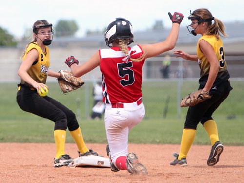 Brandon Sun 20072013 Hailey Curtis of the Westman Magic tags second base before Mikayla Rybuck of the Smitty's Terminators can make it to it during Softball Manitoba Under-14 girls provincial championship action at the North End Community Centre ball diamonds on Saturday. (Tim Smith/Brandon Sun)