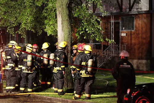 July 21, 2013 - 130721  -  Emergency personnel attend to an alleged lightning strike at 608 Sherburn Sunday, July 21, 2013. John Woods / Winnipeg Free Press