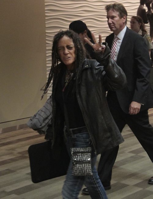 An agitated Kim Edwards gestures to cameras as she enters the Phoenix Sinclair Inquiry in the Winnipeg Convention Centre after an Inquiry break Monday morning. Carol Sanders Story. Wayne Glowacki/Winnipeg Free Press July 22 2013