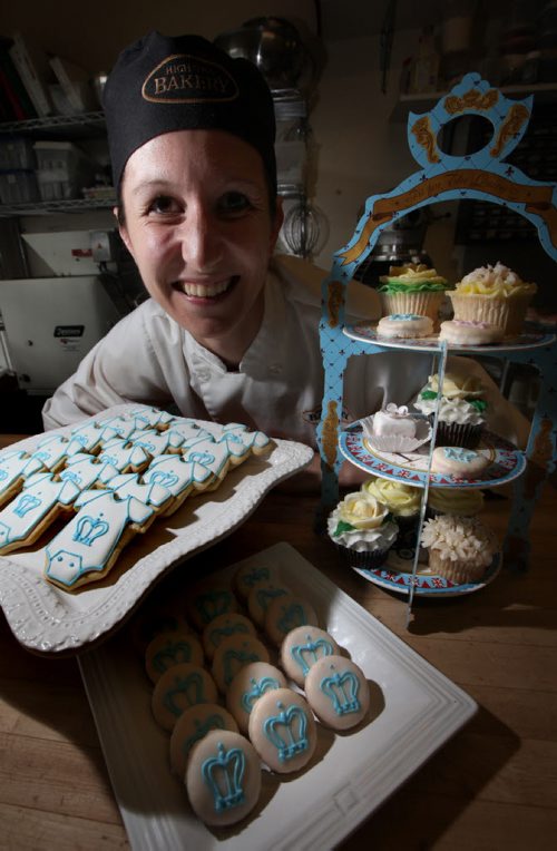 Mimi Guay, head baker at "High Tea Bakery" poses with a batch of freshly baked cookies in honor of the new male heir of the British THrone Monday. See story.  July 22, 2013 - (Phil Hossack / Winnipeg Free Press)