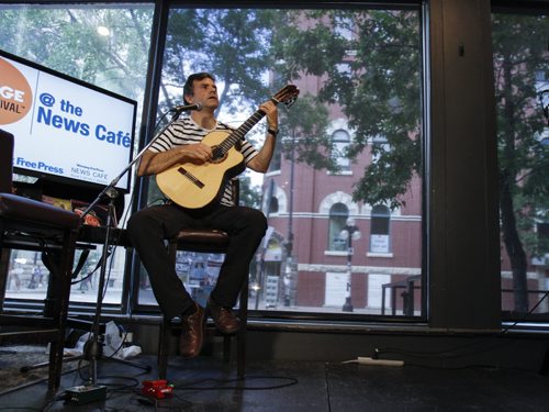 At 1 p.m. Colin Godbout, out of Vancouver BC, performed Canuck Quixote on his guitar live at the Winnipeg Free Press News Cafe. Tuesday, July 23, 2013. (JESSICA BURTNICK/WINNIPEG FREE PRESS)