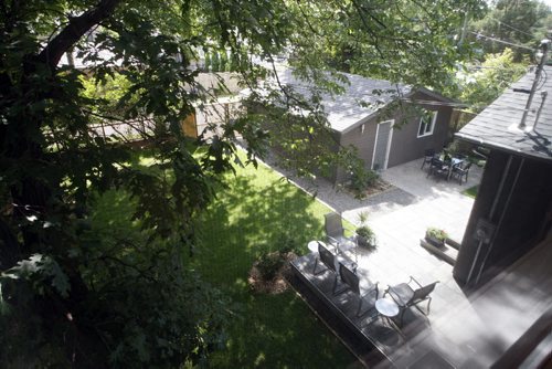 treed backyard , garage , patio  - Resale Home Äì 630 Viscount Place - todd lewys story  KEN GIGLIOTTI / JULY 23 2013 / WINNIPEG FREE PRESS