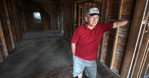 Carberry Mayor Wayne Blair stands on the gutted 2nd floor, once a Bank Manager's residence, in an abandoned Heritage Building. See Bill Redekop's story. July 23, 2013 - (Phil Hossack / Winnipeg Free Press)