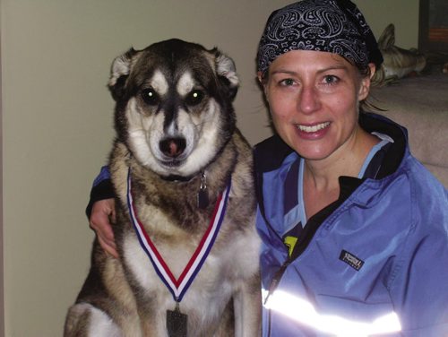 Canstar Community News July 18, 2013 - Laurie Peddle, with her late dog Irie, recently opened a dog-walking and pet-sitting business in La Salle. (SUBMITTED PHOTO/CANSTAR)