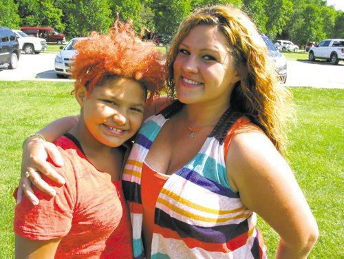 Canstar Community News July 24, 2013 -- Hannah (left) and her mom, Cori, at St. Vital Park on July 19, to celebrate the presentation of a jeep to Cori's son, Iasiah, who has leukemia, from The Dream Factory. (SIMON FULLER/CANSTAR NEWS)