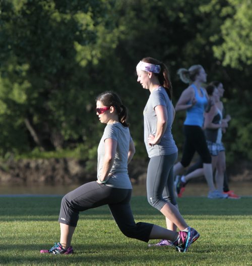On a 12C sunny Friday morning, Laurie Andrusiek, left, and Shannon Bestland participants in the Advantage Conditioning boot camp exercise session in Assiniboine North Park.  Wayne Glowacki/Winnipeg Free Press July 26 2013