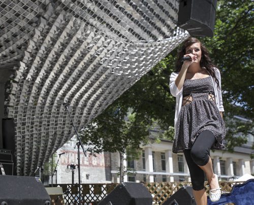 The Rachel Ashley band performs at the Cube  in the Old Market Square on Saturday afternoon, which marks the second last day of the Winnipeg Fringe Festival. Saturday, July 27, 2013.  (JESSICA BURTNICK/WINNIPEG FREE PRESS)
