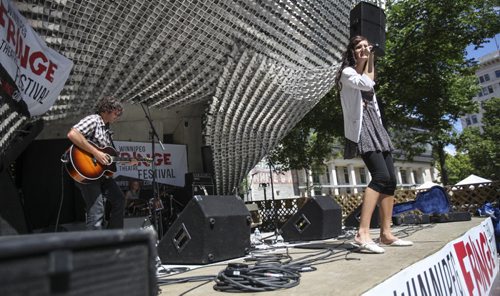 The Rachel Ashley band performs at the Cube  in the Old Market Square on Saturday afternoon, which marks the second last day of the Winnipeg Fringe Festival. Saturday, July 27, 2013.  (JESSICA BURTNICK/WINNIPEG FREE PRESS)