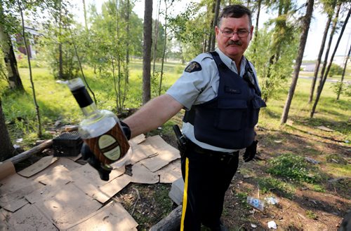 Ret. Const. Bob Gass at a drinking camp in the bushes in Thompson, Monday, July 22, 2013. (TREVOR HAGAN/WINNIPEG FREE PRESS)