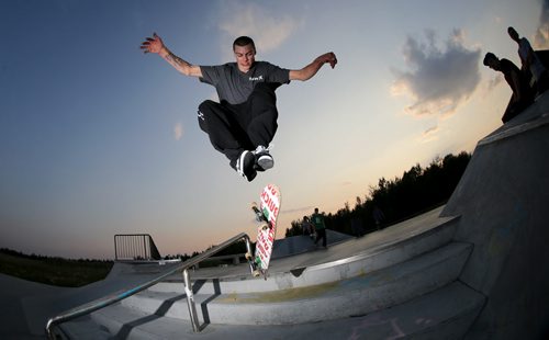 Colin Holbrow tries a 360 flip down the stairs at the Thompson Skate Park, in Thompson, Monday, July 22, 2013. (TREVOR HAGAN/WINNIPEG FREE PRESS)