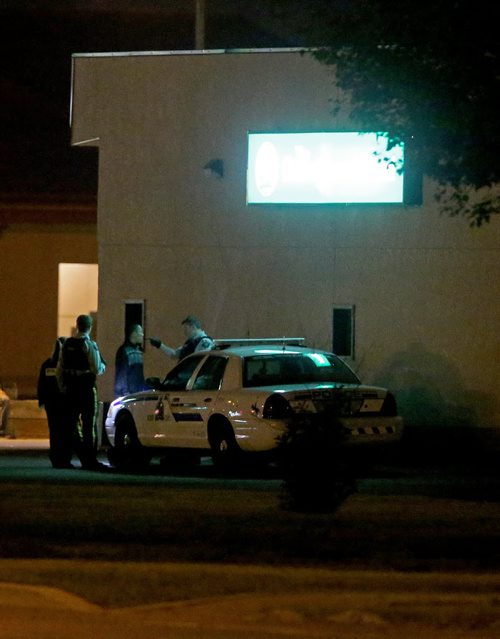 RCMP arrest an underage male, outside the Burntwood Hotel in Thompson, early, Tuesday, July 23, 2013. (TREVOR HAGAN/WINNIPEG FREE PRESS)