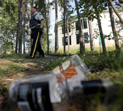 Ret. Const. Bob Gass at a drinking spot in the bushes near the Burntwood Hotel, Monday, July 22, 2013. (TREVOR HAGAN/WINNIPEG FREE PRESS)