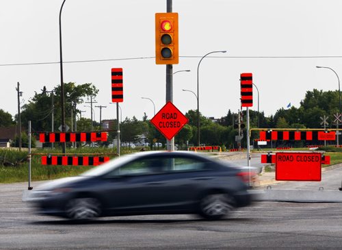 Roads have been closed in preparation for  the $77million Plessis Rd Underpass Project that will take 18 months to complete , the closure is between Dugald Rd. And Kernaghan Ave , the construction will route the rail line over the road by bridges  KEN GIGLIOTTI / JULY 29 2013 / WINNIPEG FREE PRESS