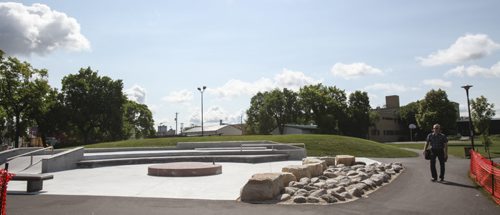 Families and residents of two inner-city neighbourhoods are already making use of two newly redeveloped parks in Winnipeg; Chief Grizzly Bear's Garden (formerly known as Spence Aboriginal Spirit Park) on Sherbrooke St. at Sargent, and Jacob Penner Park on Victor Ave. at Notre Dame (shown). The announcement was made from the Sherbrooke location by Justice Minister Andrew Swan and Mayor Sam Katz. Joint funding in the amount of $475,000 was provided by the province and the city through the Building Communities Initiative. Tuesday, July 30, 2013. (JESSICA BURTNICK/WINNIPEG FREE PRESS)