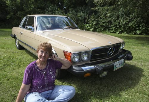 This 1974 Mercedes-Benz 450SLC was purchased on eBay from Ventura, California by Winnipegger Roberta Beach (pictured) in January, and shipped in early Spring. It was first owned, however, by American actress Carol Burnett, who is best known for her variety show The Carol Burnett Show. Tuesday, July 30, 2013. (JESSICA BURTNICK/WINNIPEG FREE PRESS)