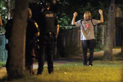 July 31, 2013 - 130730  -  Winnipeg police detain residents of 891 Aberdeen early Wednesday morning, July 31, 2013. John Woods / Winnipeg Free Press