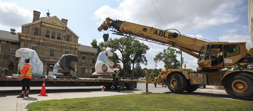 CancerCare bears on the move. Both polar bear sculptures located at York and Vaughn St., as well as several located behind the Manitoba Legislature along Assiniboine Dr., were removed today and transported to a new home. Wednesday, July 31, 2013. (JESSICA BURTNICK/WINNIPEG FREE PRESS)