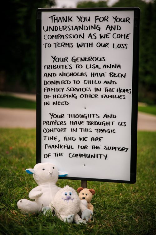 The memorial of stuffed animals and personal notes near Lisa Gibson's family home in Westwood has been replaced with a hand written sign thanking the community for their support. 130801 - Thursday, August 01, 2013 - (Melissa Tait / Winnipeg Free Press)