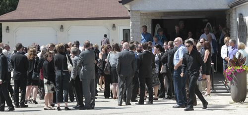 Mourners leave the MacKenzie Funeral Home in Stonewall.Mb. after the memorial service on Thursday for Lisa Gibson, her two-year-old daughter, Anna  and three-month-old son, Nicholas. Lisa Michelle Gibson was found in the Red River a few days after her two-year-old daughter, Anna, and three-month-old son, Nicholas, were rushed to hospital after being found in their home.  Randy Turner/ Kevin Rollason story  Wayne Glowacki / Winnipeg Free Press Aug.1  2013