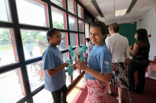 Lord Selkirk Summer Learning program students Reem Bensalah (right) and Carlicia Williams (left) head out of the school to try out their   homemade rockets after press conference by Education Minister Nancy Allen announcing the expansion of the CSI Program. See Carol Sanders story. August 1, 2013 Ruth Bonneville Winnipeg Free Press