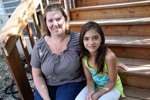 Nicole Abbott and her daughter, Paige Ortiz, 10. Paige went to Camp Arnes last week. 130801 August 01, 2013 Mike Deal / Winnipeg Free Press