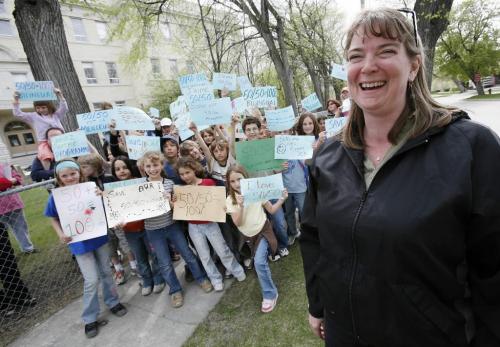 John Woods / Winnipeg Free Press / May 11/07- 070511  - Backed up by students and parents from Ecole Provencher Alison Weir is leading the charge against the Louis Riel school division's plans to change the school's curriculum from a 50/50 program to a 100% french immersion program.   Photographed outside Ecole Provencher Friday, May 11/07.