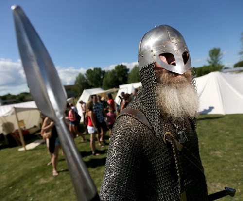 Tracy Stubbert, aka, Grimnir, a member Vikings Vinland, a group made up of members from across Canada, the US and Europe, stands in the Viking Village at the Icelandic Festival of Manitoba in Gimli, Saturday, August 3, 2013. (TREVOR HAGAN/WINNIPEG FREE PRESS)