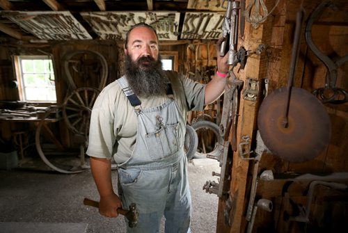 Dave Martens, blacksmith at the Steinbach Pioneer Days at the Steinbach Mennonite Heritage Village, Sunday, August 4, 2013. (TREVOR HAGAN/WINNIPEG FREE PRESS)