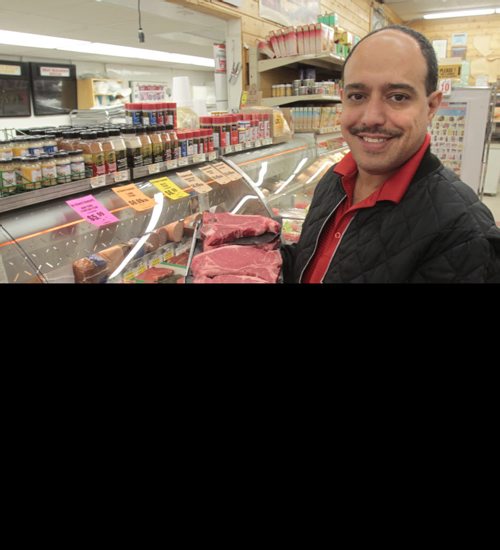 Munther Zeid with beef at the FoodFare store on Portage Ave. He is one of the owners of five FoodFares in the city. Martin Cash story Wayne Glowacki / Winnipeg Free Press Aug. 6  2013