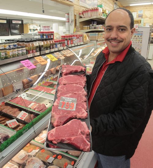 Munther Zeid with beef at the FoodFare store on Portage Ave. He is one of the owners of five FoodFares in the city. Martin Cash story Wayne Glowacki / Winnipeg Free Press Aug. 6  2013