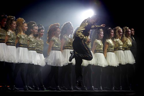 Irish dancers light up the stage at the Celtic Ireland pavilion at Folklorama. The pavilion is located at the Fort Garry Curling Club on Archibald.  BORIS MINKEVICH / WINNIPEG FREE PRESS.