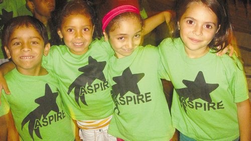 Canstar Community News July 31 -- Participants in Louis Riel School Division's ASPIRE program (from left): Satniner Gondal, Layla McCurdy, Ranin Asker and Shams Alshamary Adriano Magnifico/Canstar