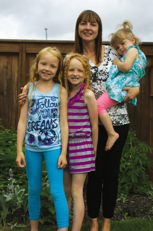 Canstar Community News July 31, 2013 - Former Transcona resident Kristen McDowell is shown with daughters Calla, Maya, and Aria. The family is organizing a run in memory of their daughter and sister Georgia, who died in 2009 of spinal muscular atrophy. (DAN FALLOON/CANSTAR COMMUNITY NEWS/HERALD)