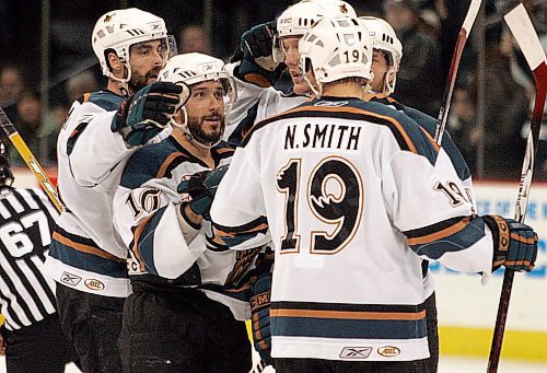 BORIS MINKEVICH / WINNIPEG FREE PRESS 070514 Moose Brandon Reid #10 (with beard looking to the right) scored the second goal in second period power play.