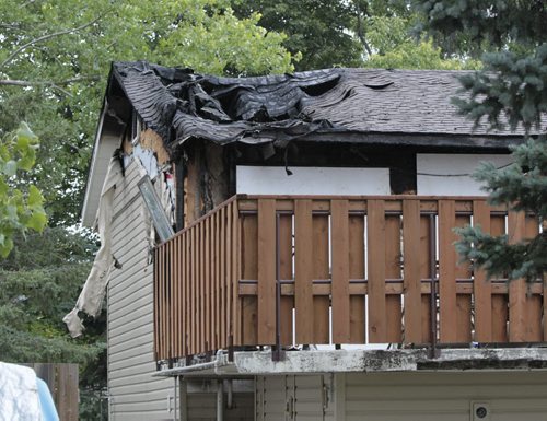 Extensive damage to a home at 14 Bromton Rd. from a fire Thursday night. Wayne Glowacki/Winnipeg Free Press August 9 2013