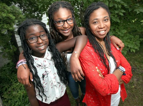 Marie Pudwill (right) poses with her daughters  Aliyah 11, and Taina 12, who went to Camp Nutimik in July (their sister Abby (not in photo) is counselling there this summer).  August 9, 2013 - (Phil Hossack / Winnipeg Free Press)