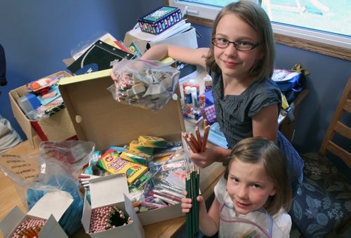 Two sisters Amelia Little, 9 yrs, and Evelyn Lille, 7 years, are raising money by selling lemonade at the Blue Bombers game next Friday.  All proceeds will go towards Winnipeg Harvest to buy school supplies. See  Elizabeth Fraser story- August 09, 2013   (JOE BRYKSA / WINNIPEG FREE PRESS)