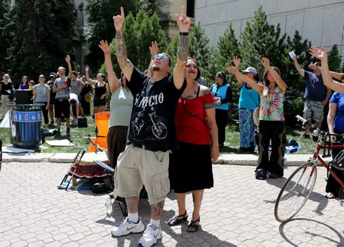 A group that gathered across from the Remand Centre waving at prisoners inside, during National Prisoner Justice Day, Saturday, August 10, 2013. (TREVOR HAGAN/WINNIPEG FREE PRESS)