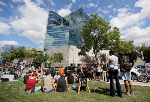 A group that gathered across from the Remand Centre during National Prisoner Justice Day, Saturday, August 10, 2013. (TREVOR HAGAN/WINNIPEG FREE PRESS)