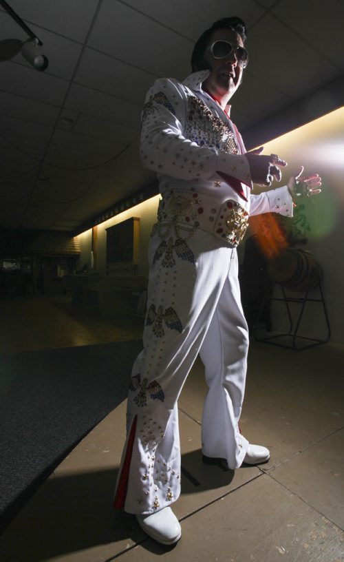 Gil "Gilvis" White of Regina, Sask. practices his moves moments before he's destined to grace the stage at the Gimli Recreation Centre at the Gimli Elvis Festival on Saturday, August 10, 2013. (JESSICA BURTNICK/WINNIPEG FREE PRESS)