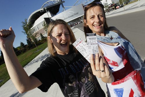 August 12, 2013 - 130811  -  Cathy Anderson and Lisa Bowman are excited to be seeing Paul McCartney in concert at Investors Group Field in Winnipeg Monday, August 12, 2013. John Woods / Winnipeg Free Press