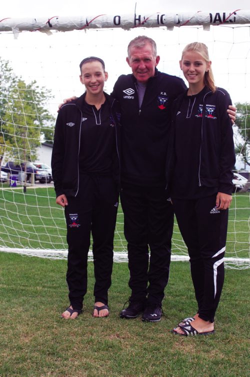 Canstar Community News Aug. 9, 2013 - Phoenix Fury head coach Kenny Brannigan is flanked by players Megan Diamond (left) and Mackenzie Jamieson (right). The club recently completed a 12-day tour of Scotland. (DAN FALLOON/CANSTAR COMMUNITY NEWS/HERALD)