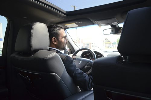 Aman Brar with Holiwood limousine service, driving a new lincoln mkt delux l edition. Photo by Oliver Sachgau. Winnipeg Free Press.