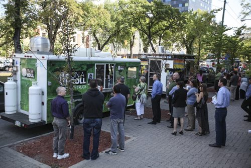 The Downtown BIZ launched the third annual ManyFest beneath the elms on Broadway today with a food truck war between businesses Pimp My Rice, Habanero Sombrero and On A Roll. Wednesday, August 14, 2013. (ELIZABETH FRASER) (JESSICA BURTNICK/WINNIPEG FREE PRESS)