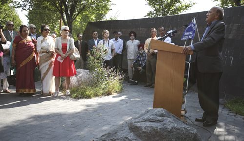 Dr. K. Dakshinamurti, president of the Mahatma Gandhi Centre of Canada, spoke to the crowd gathered at The Forks today for an honourary street naming -- many of them from the Indian community. York St. between Main St. and Waterfront Dr. has been honourarily renamed Mahatma Gandhi Way. Thursday, August 15, 2013. (JESSICA BURTNICK/WINNIPEG FREE PRESS)