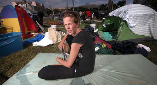 Michell (no last name given) sits in a tent village, camped out on Martha Street across the street from the Salvation Army Thursday afternoon. The admitted sniff addict is fIve months pregnant. She's lived in Winnipeg for 10 years, five of them on the street. See Oliver's story. August 15, 2013 - (Phil Hossack / Winnipeg Free Press)