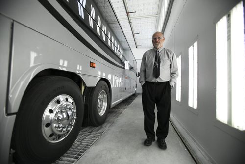 Jim Macdonald, executive director of engineering for Motor Coach Industries, works closely with Winnipeg's Composites Innovation Centre to develop new composite parts used in the manufacture of its highway coaches. Thursday, August 15, 2013. (MCNEILL) (JESSICA BURTNICK/WINNIPEG FREE PRESS)