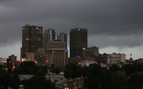 Storm front as it approached downtown Winnipeg, Sunday, August 18, 2013. (TREVOR HAGAN/WINNIPEG FREE PRESS)