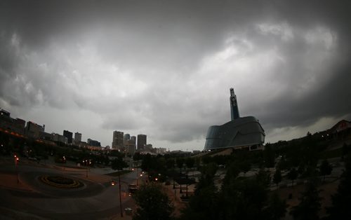 A storm front moves towards downtown Winnipeg a seen from The Forks parkade, Sunday, August 18, 2013. (TREVOR HAGAN/WINNIPEG FREE PRESS)